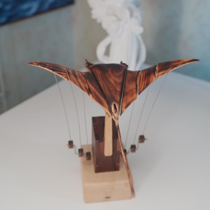 Load video: Handcrafted Wooden Manta Ray Automaton